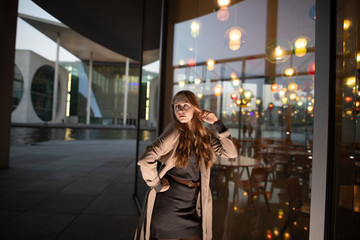 young woman in nice dress around berlin 