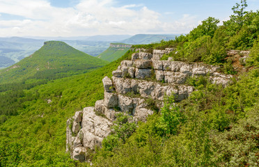 stone ridge with a platform for viewing the landscape and mountains in the form of a pyramid