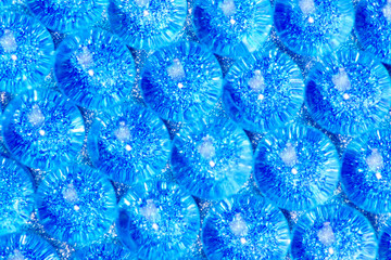 sparkles translucent through blue hydrogel