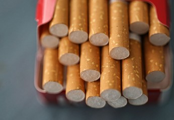 cigarettes on white background 