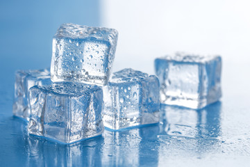 stack of melted ice cubes close up selective focus