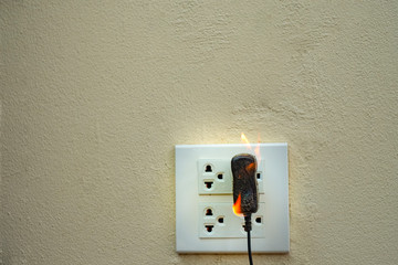 On fire electric wire plug Receptacle and adapter on partition, Electric short circuit failure...