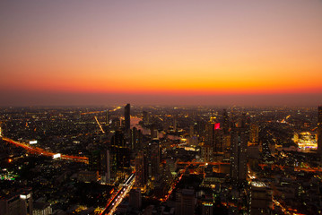 Fototapeta na wymiar Aerial view Cityscape Bangkok skyline with sunset in Thailand