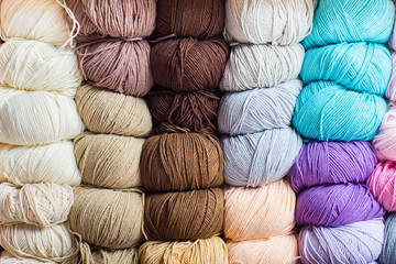 Knitting accessories. Colorful colorful skeins of yarn. Storage. Brown, blue, milk, beige, gray,...