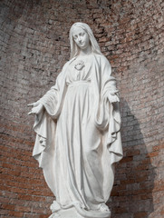 Statue in stone of Virgin Mary