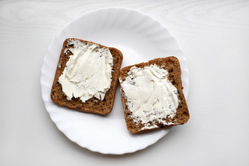 seed bread with soft cottage cheese