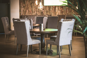 Modern Cafe Interior Table and chairs with Light colored walls