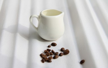 milk jug on a white background around the coffee mirrors