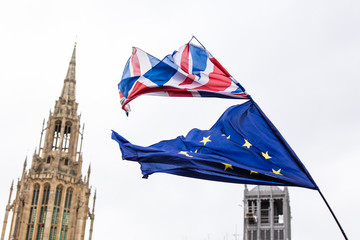 Fototapeta na wymiar European Union and British Union Jack flag flying together. 