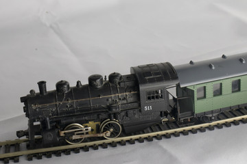 Vintage locomotive pulling wagon (toy miniature 65:1) from private collection