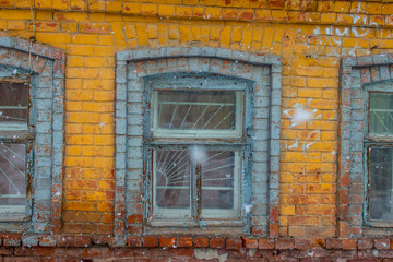 Windows in an old brick house