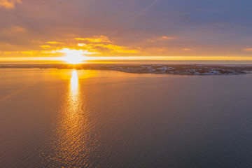 Fototapeta na wymiar Archipelago in sunset in winter