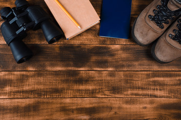 Binoculars on the wooden table