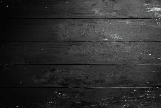 Old wooden black background. Top view. Free copy space.