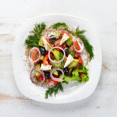 Greek salad with feta cheese. Top view. free copy space.
