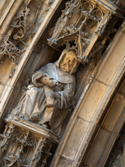 Close up of statue decorated at entrance of Aix Cathedral (Cathédrale Saint-Sauveur...