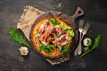 Barbecue. Roasted quail with vegetables. Top view. Free space for your text.