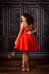 Beautiful,  Biracial High School Senior wearing red prom dress © Mary Perry