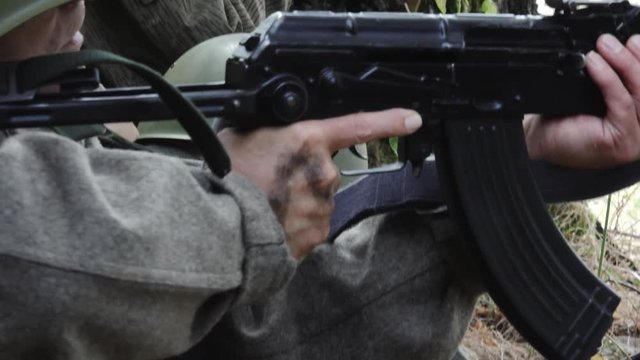 Close Soldiers in a forest aim some targets