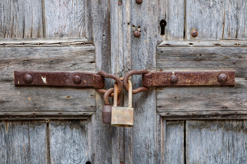 padlock on old wooden door