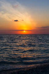 Amazing sea sunset, the sun, waves, clouds