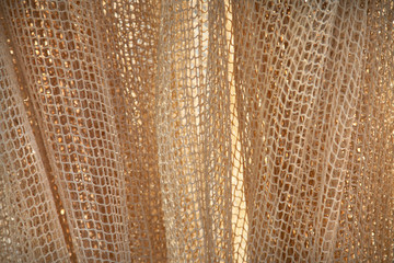 Background with fishermans net close up view