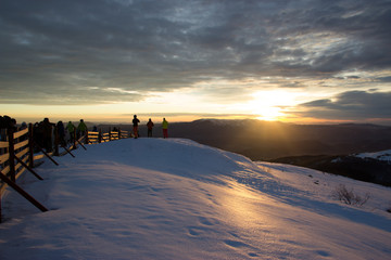 Skiers on high mountain