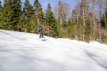 Fototapeta na wymiar Skiers on high mountain