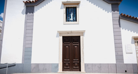 Small white church typical of the Algarve in Portugal
