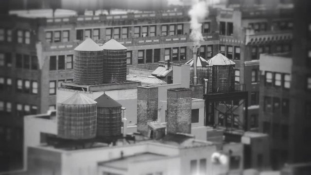 NYC Manhattan roof wooden water tanks smoke stack industrial vintage film look black white.mov