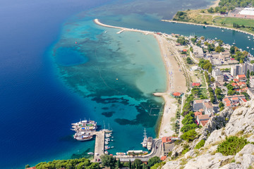 Beautiful aerial view of the coastline and the Adriatic sea, Omis town, Dalmatia region, Croatia