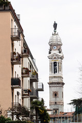 Fototapeta na wymiar urban houses and bell tower of Basilica in Bergamo