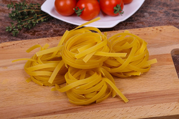 Raw pasta fettuccini