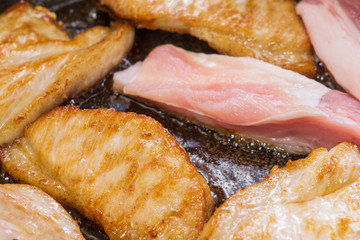 cooking roast pork in a pan