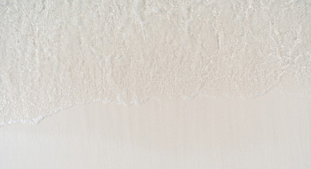 wave in white beige sand