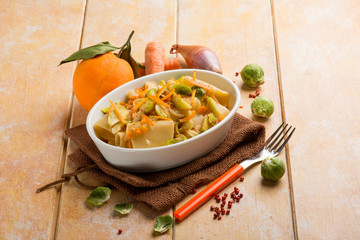 pasta with brussel sprouts pink pepper and orange peel