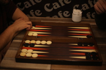 people playing backgammon
