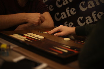 people playing backgammon