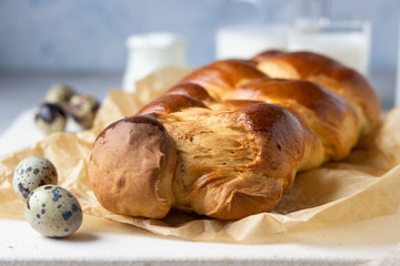Traditional Easter bread (Challah or  Cozonac). Freshly baked sweet braided bread loaf. 