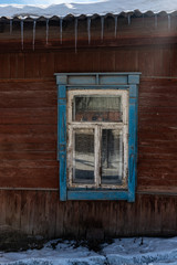 Vintage window in a wooden house