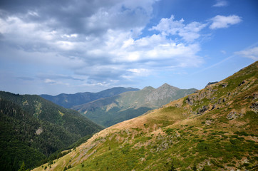 Naklejka premium Panoramic view from Old mountain, Bulgaria. Ambaritsa peak in background. Cloudy summer day.