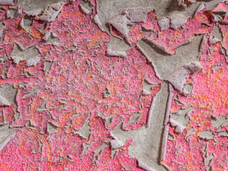 Abblättern einer Alten rosa Hauswand