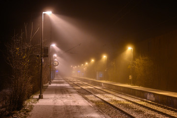 Trainstation in Winter with Snow and Fog