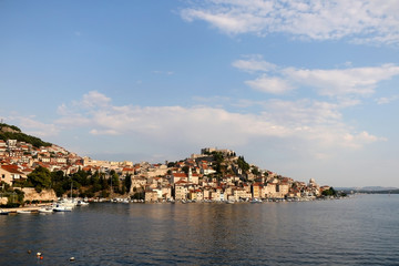 Fototapeta na wymiar Panoramic view of Sibenik in the background. Sibenik is popular summer travel destination. 
