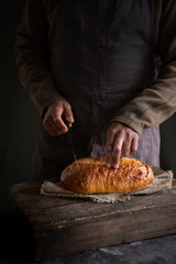 Chef with Artisan rustic handmade bread 