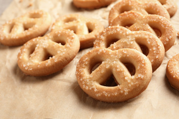 Tasty Danish butter cookies on paper background, closeup