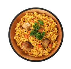 Bowl with rice pilaf and meat on white background, top view