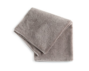 Soft folded towel isolated on white, top view