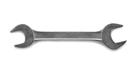 New wrench on white background, top view. Plumber tools