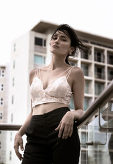 High fashion young elegant woman with architecture